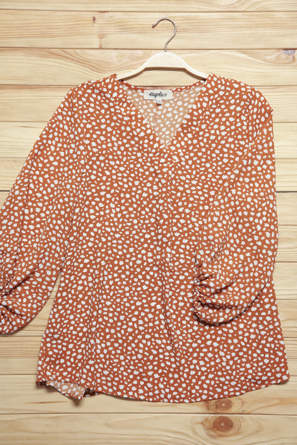 Rust Abstract Dot V Neck Woven Top